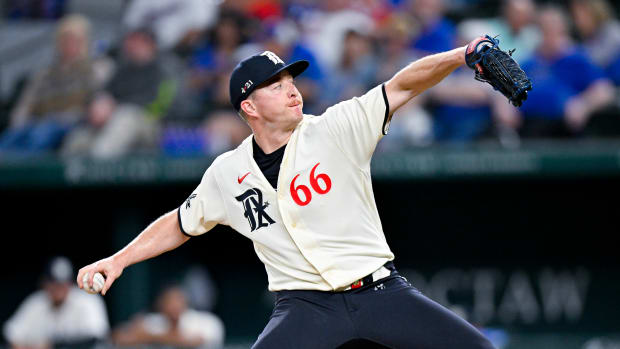 Apr 22, 2023; Arlington, Texas, USA; Texas Rangers relief pitcher Josh Sborz (66) pitches against the Oakland Athletics during the eighth inning at Globe Life Field. Mandatory Credit: Jerome Miron-USA TODAY Sports